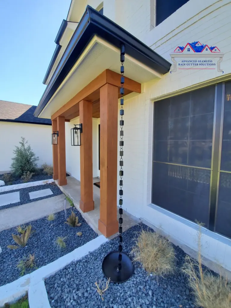 Seamless+rain+gutters+rain+chains+on+house+in+Kyle,+Tx 1920w